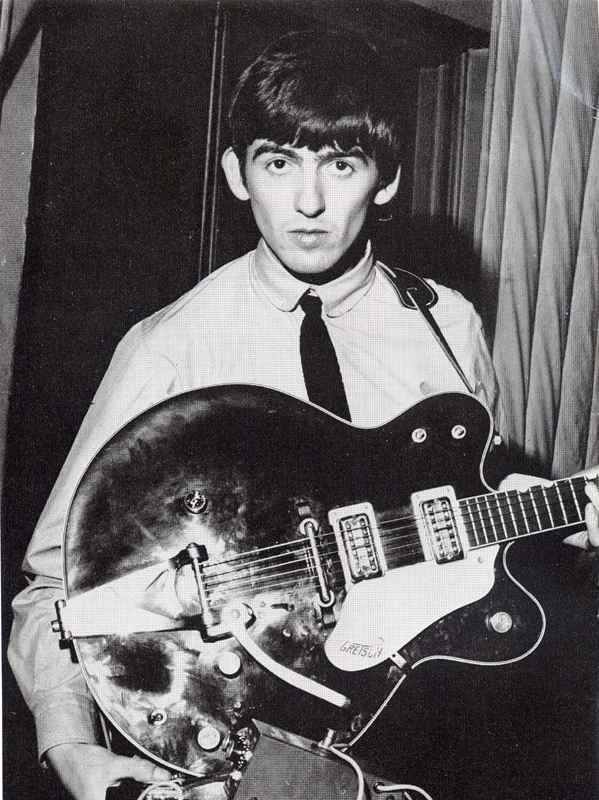George Harrison playing guitar on July 1st 1963 with a Maestro Fuzz-Tone. (Photo credit unknown)