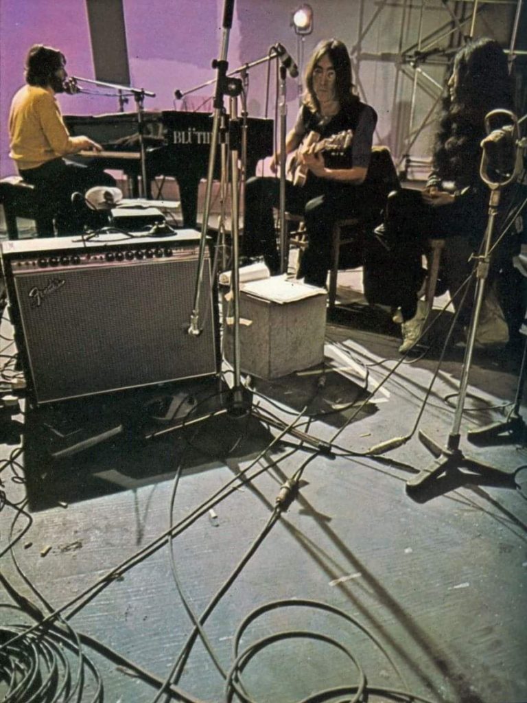 The Beatles rehearsing in January 1969 at Twickenham film studios, with a silver (Dallas) Arbiter Fuzz Face. (Photo credit: Ethan Russell)